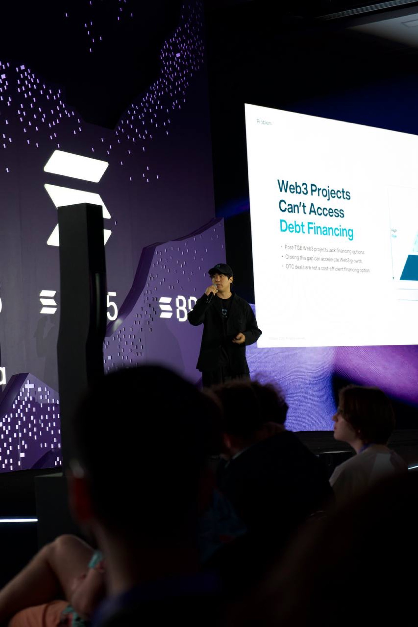 Ryan presenting AI and debt infrastructure on stage